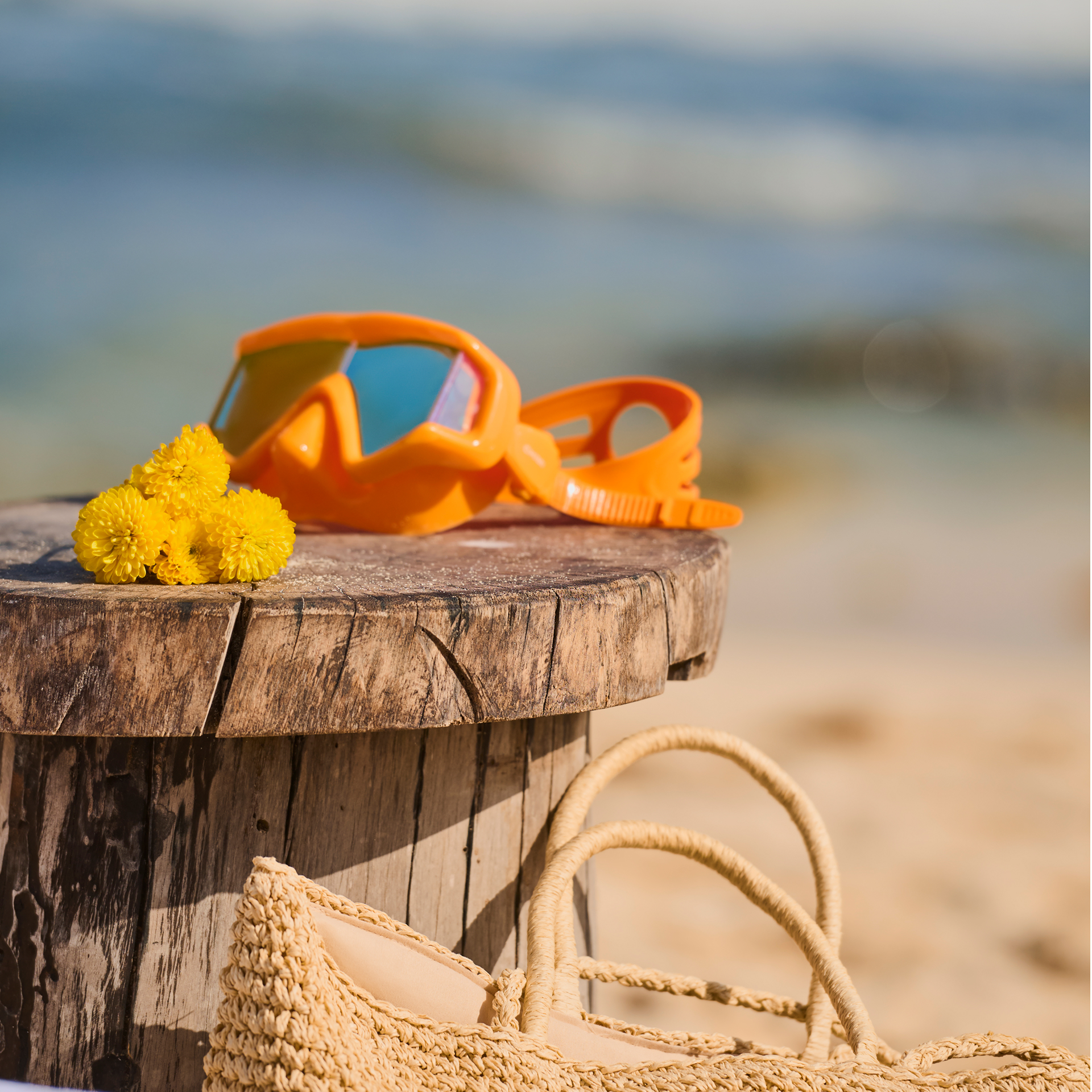 Beach accessories on a wooden table